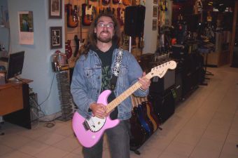 Tino playing his Hello Kitty Guitar